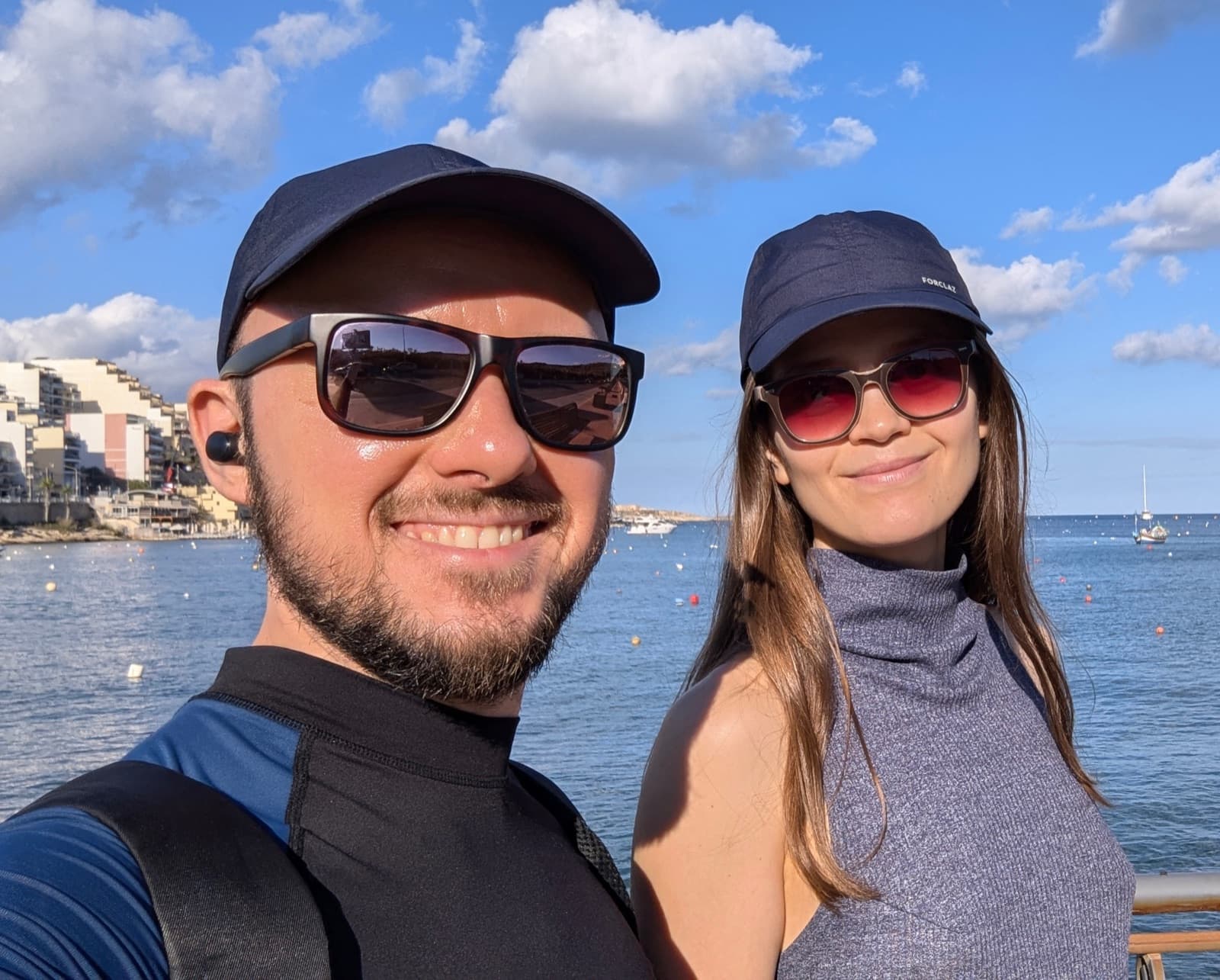 Dzmitry and Natallia, HouseSit's founders, on a seaside walk during a house sit