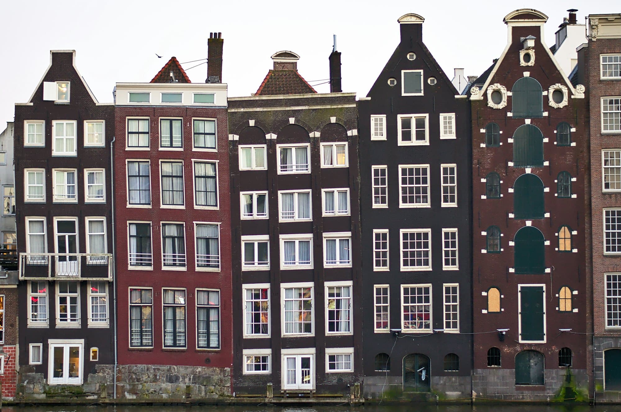 Colourful Dutch houses under a clear sky