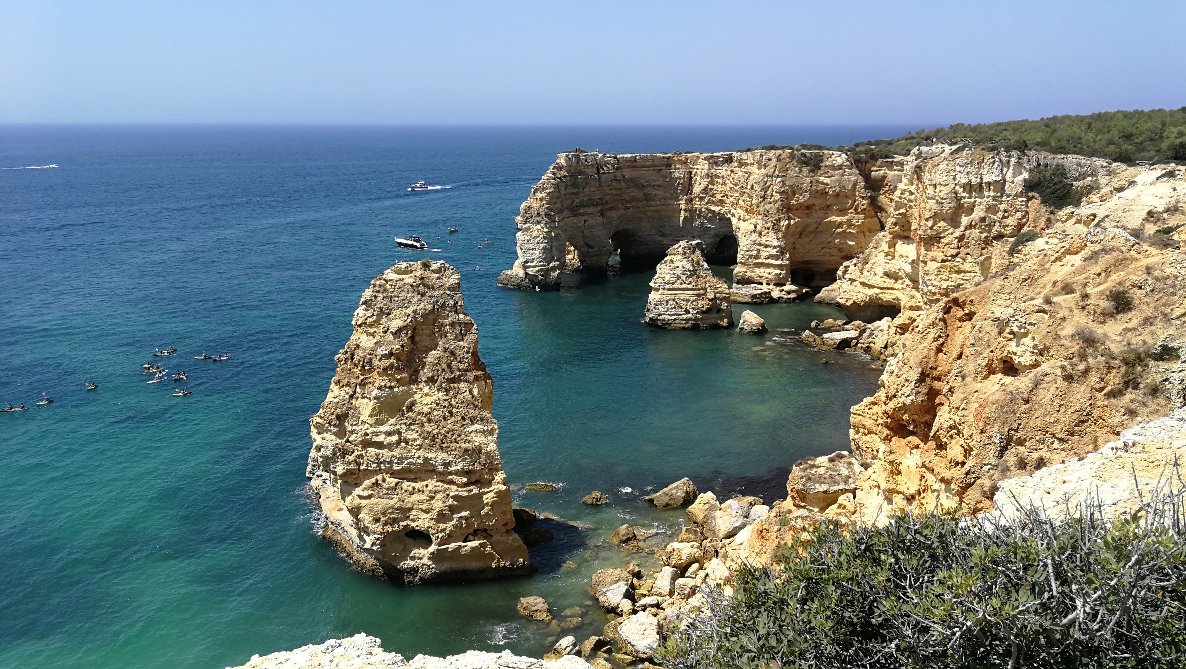 Golden cliffs and turquoise coves on the Algarve coast